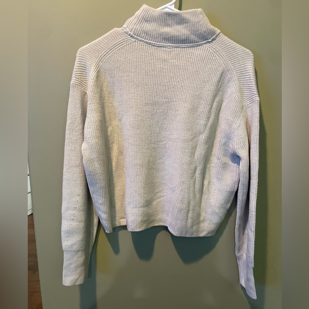Lululemon Merino Wool-Blend Ribbed Turtleneck Sweater in Heathered Natural Ivory - Picture 6 of 7